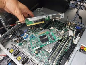 Our engineer replacing LAN interface card from a HP server.